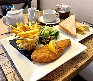 Lunch served at Bensons with salad and chips
